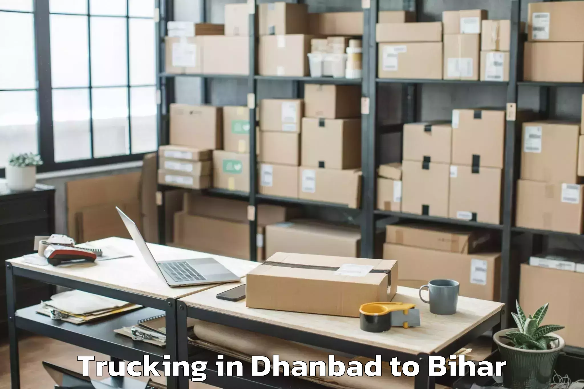 Easy Dhanbad to Belhar Trucking Booking